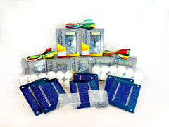 Kit image. Supplies pictured: 6 PV Panels 6 Buzzers 1 Bag of LEDs 12 Multimeters 15 Sets of alligator clips 24 Ping pong balls